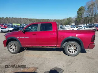 2011 Ram 1500 Big Horn with VIN 1D7RV1CT0BS623605, listed as a IAAI auction lot 41278351 with 198,313 mi miles and . Bid and sale history available at DreamBid. Image 14.