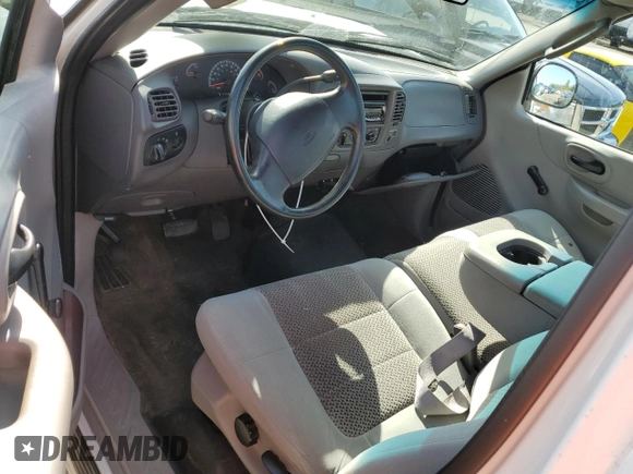 2002 Ford F-150 XL with VIN 1FTRF17W92NB42259, listed as a Copart auction lot 52986475 with 117,746 mi miles and Salvage title. Bid and sale history available at DreamBid. Image 8.