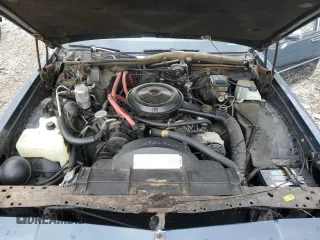 1985 Oldsmobile Delta Royale z VIN 1G3BN69YXF9080322, wystawiony jako Copart lot #78670094 z przebiegiem 58 231 mil mil oraz Tytuł czysty. Historia ofert i sprzedaży dostępna na DreamBid. Obrazek 11.
