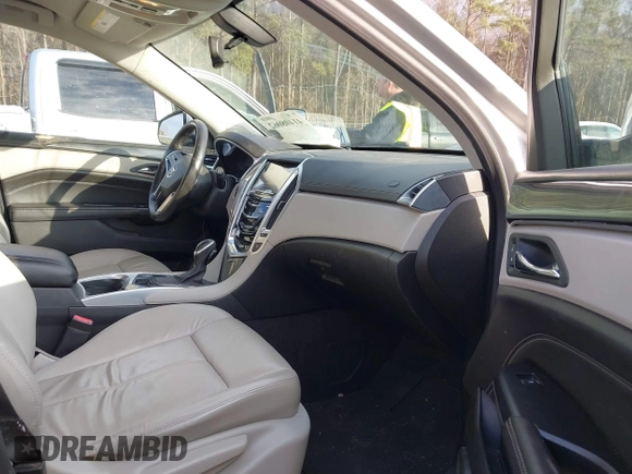 2014 Cadillac SRX with VIN 3GYFNAE39ES688059, listed as a IAAI auction lot 41408062 with 192,770 mi miles and . Bid and sale history available at DreamBid. Image 5.