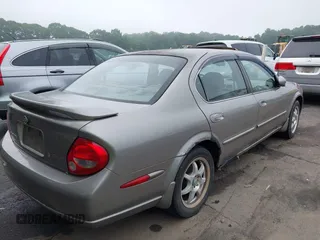 2001 Nissan Maxima SE z VIN JN1CA31D61T830594, wystawiony jako IAAI lot #42283716 z przebiegiem 218 155 mil mil oraz . Historia ofert i sprzedaży dostępna na DreamBid. Obrazek 4.