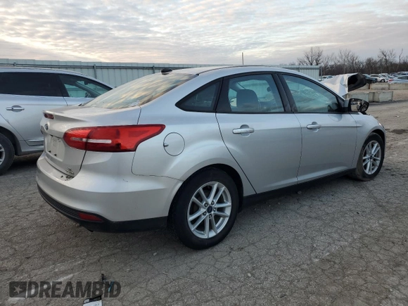 2015 Ford Focus SE with VIN 1FADP3F2XFL306322, listed as a Copart auction lot 41367765 with 58,901 mi miles and Salvage Title. Bid and sale history available at DreamBid. Image 3.