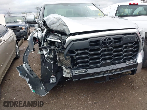 2022 Toyota Tundra Limited Hybrid with VIN 5TFJC5DB8NX009385, listed as a IAAI auction lot 41952224 with 40,497 mi miles and . Bid and sale history available at DreamBid. Image 6.