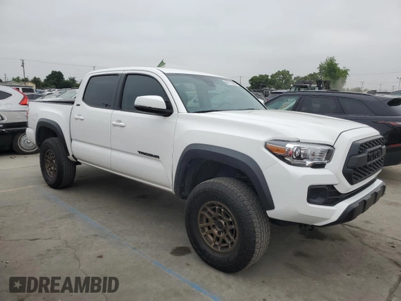 2023 Toyota Tacoma SR с VIN 3TYCZ5AN7PT114941, выставлен на аукционе Copart как лот 60172965 с пробегом 23 116 миль миль и Списание • Salvage title. История ставок и продаж доступна на DreamBid. Изображение 4.