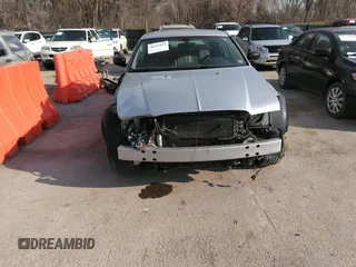 2007 Chrysler 300 Touring with VIN 2C3LA53G57H785979, listed as a IAAI auction lot 36241614 with 220,841 mi miles. Bid and sale history available at carsss.com. Image 6.
