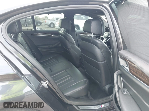 2019 BMW 5 Series M550i xDrive with VIN WBAJB9C51KB287797, listed as a IAAI auction lot 41549311 with 61,459 mi miles and . Bid and sale history available at DreamBid. Image 8.