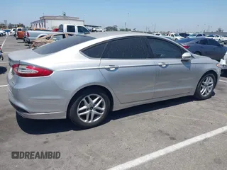 2013 Ford Fusion SE z VIN 3FA6P0HR7DR227402, wystawiony jako IAAI lot #42660169 z przebiegiem 98 853 mil mil oraz . Historia ofert i sprzedaży dostępna na DreamBid. Obrazek 4.