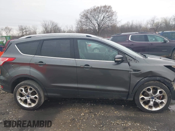 2015 Ford Escape Titanium with VIN 1FMCU9J94FUB49236, listed as a IAAI auction lot 42117378 with 112,267 mi miles. Bid and sale history available at carsss.com. Image 14.