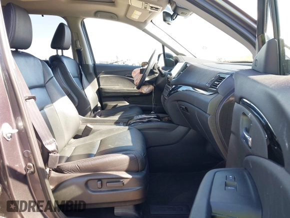 2021 Honda Pilot Touring 8-Passenger with VIN 5FNYF6H97MB034399, listed as a IAAI auction lot 42303419 with 50,034 mi miles and . Bid and sale history available at DreamBid. Image 5.