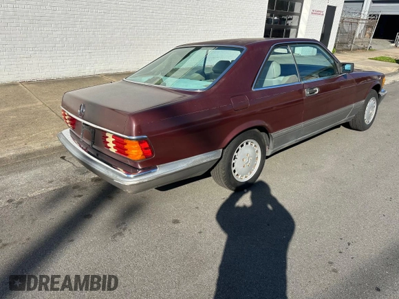 1986 Mercedes-Benz 560 with VIN WDBCA45D2GA206016, listed as a Copart auction lot 54577205 with 205,332 mi miles and Clean Title. Bid and sale history available at DreamBid. Image 4.