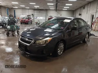 2014 Subaru Impreza Premium with VIN JF1GJAC63EH018119, listed as a IAAI auction lot 42387914 with 163,654 mi miles and . Bid and sale history available at DreamBid. Image 2.