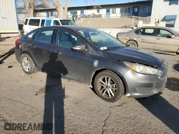 2016 Ford Focus SE with VIN 1FADP3F20GL346250, listed as a Copart auction lot 42645315 with 92,534 mi miles and Salvage title. Bid and sale history available at DreamBid. Image 4.
