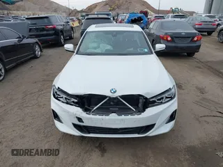 2024 BMW 3 Series 330i xDrive with VIN 3MW89FF04R8E84855, listed as a IAAI auction lot 41318061 with 1,047 mi miles. Bid and sale history available at carsss.com. Image 12.