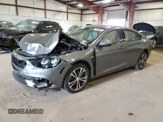 2019 Buick Regal Essence with VIN W04GP6SX4K1017950, listed as a Copart auction lot 71864094 with 60,000 mi miles and Salvage title. Bid and sale history available at DreamBid. Image 1.