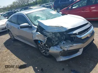 2018 Honda Civic EX with VIN 19XFC2F7XJE015793, listed as a IAAI auction lot 41991788 with 115,137 mi miles and . Bid and sale history available at DreamBid. Image 1.