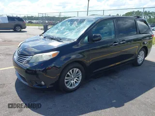 2016 Toyota Sienna XLE with VIN 5TDYK3DC8GS711357, listed as a IAAI auction lot 42525086 with 180,296 mi miles and . Bid and sale history available at DreamBid. Image 2.