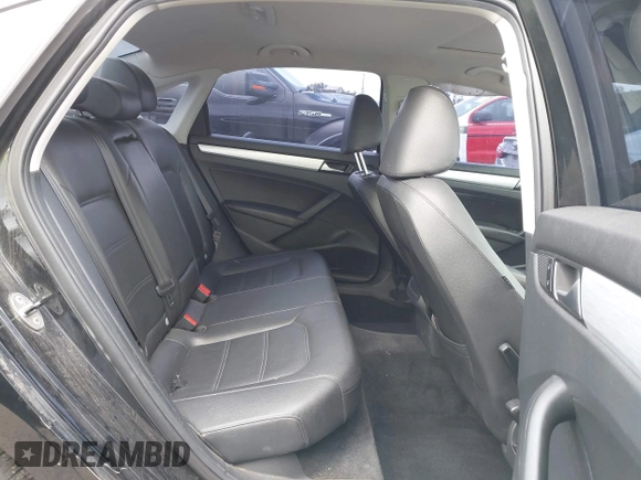 2012 Volkswagen Passat SE with VIN 1VWBP7A31CC047883, listed as a IAAI auction lot 42130138 with 142,017 mi miles. Bid and sale history available at carsss.com. Image 8.