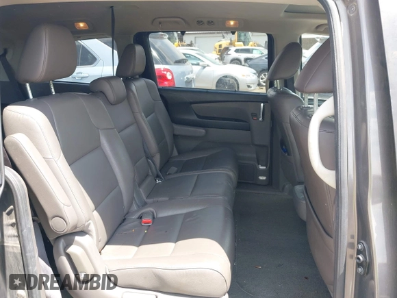 2014 Honda Odyssey EX-L z VIN 5FNRL5H64EB089875, wystawiony jako IAAI lot #42279431 z przebiegiem 107 716 mil mil oraz . Historia ofert i sprzedaży dostępna na DreamBid. Obrazek 8.