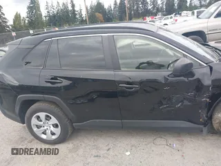 2019 Toyota RAV4 LE with VIN JTMF1RFV4KD030550, listed as a IAAI auction lot 40596628 with 92,318 mi miles and . Bid and sale history available at DreamBid. Image 12.