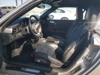 2005 Porsche 911 Carrera S z VIN WP0CB29995S765398, wystawiony jako Copart lot #42413555 z przebiegiem 32 993 mil mil oraz Szkoda całkowita • Salvage title. Historia ofert i sprzedaży dostępna na DreamBid. Obrazek 7.