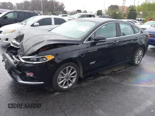 2018 Ford Fusion Energi SE with VIN 3FA6P0PU2JR277481, listed as a IAAI auction lot 41778140 with 51,933 mi miles. Bid and sale history available at carsss.com. Image 2.
