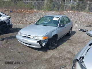 2002 Ford Escort Fleet Standard z VIN 3FAFP13P12R209941, wystawiony jako IAAI lot #41790208 z przebiegiem 112 422 mil mil oraz . Historia ofert i sprzedaży dostępna na DreamBid. Obrazek 2.