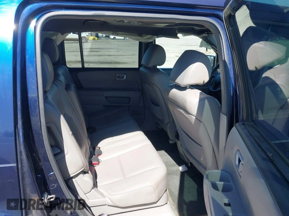 2013 Honda Pilot Touring with VIN 5FNYF3H94DB018384, listed as a IAAI auction lot 41672767 with 188,922 mi miles and . Bid and sale history available at DreamBid. Image 8.