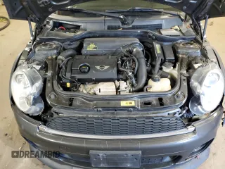 2012 MINI Coupe S z VIN WMWSX3C50CT154835, wystawiony jako Copart lot #76659984 z przebiegiem 122 425 mil mil oraz Szkody całkowita. Historia ofert i sprzedaży dostępna na DreamBid. Obrazek 11.