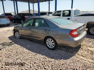 2004 Toyota Camry LE with VIN 4T1BF30K24U569209, listed as a Copart auction lot 66181644 with 186,412 mi miles and Salvage Title. Bid and sale history available at carsss.com. Image 2.