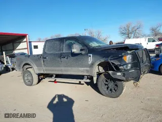 2017 Ford Super Duty F-250 SRW Lariat with VIN 1FT7W2BT8HED31729, listed as a IAAI auction lot 41396178 with 128,564 mi miles. Bid and sale history available at carsss.com. Image 12.