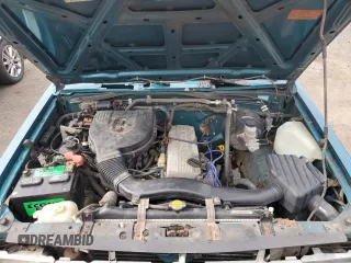 1997 Nissan Frontier XE with VIN 1N6SD11Y4VC346711, listed as a Copart auction lot 61025615 with 100,417 mi miles and Clean title. Bid and sale history available at DreamBid. Image 11.
