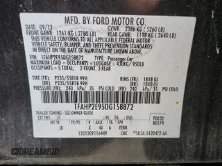 2013 Ford Taurus SEL with VIN 1FAHP2E95DG158872, listed as a Copart auction lot 50593795 with 177,696 mi miles and Salvage Title. Bid and sale history available at carsss.com. Image 14.