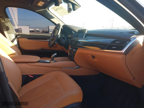 2019 BMW X6 sDrive35i with VIN 5UXKU0C57K0S97581, listed as a IAAI auction lot 41322568 with 76,635 mi miles. Bid and sale history available at carsss.com. Image 5.