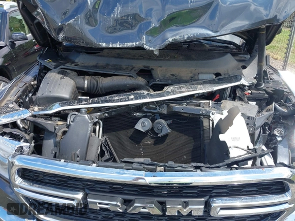 2019 Ram 1500 Tradesman z VIN 1C6SRFCT5KN597618, wystawiony jako IAAI lot #42243878 z przebiegiem 69 131 mil mil oraz . Historia ofert i sprzedaży dostępna na DreamBid. Obrazek 10.