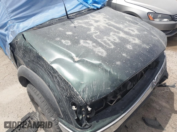 2003 Toyota Tacoma PreRunner z VIN 5TEGN92N53Z231042, wystawiony jako Copart lot #55854505 z przebiegiem Nie podano mil oraz Szkoda całkowita • Salvage title. Historia ofert i sprzedaży dostępna na DreamBid. Obrazek 11.