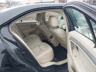 2016 Ford Taurus SEL with VIN 1FAHP2H8XGG147003, listed as a IAAI auction lot 41920397 with 113,891 mi miles and . Bid and sale history available at DreamBid. Image 8.
