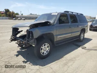 2002 Chevrolet Suburban LT z VIN 1GNFK16T32J242667, wystawiony jako Copart lot #57413185 z przebiegiem Nie podano mil oraz Szkoda całkowita • Salvage title. Historia ofert i sprzedaży dostępna na DreamBid. Obrazek 1.