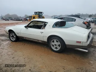 1979 Pontiac Firebird z VIN 2U87K9N120105, wystawiony jako Copart lot #84729164 z przebiegiem 87 739 mil mil oraz Tytuł czysty. Historia ofert i sprzedaży dostępna na DreamBid. Obrazek 2.