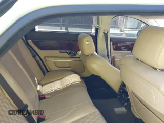 2016 Jaguar XJ Portfolio with VIN SAJWJ2GD8G8W00063, listed as a IAAI auction lot 42076707 with Not provided miles and . Bid and sale history available at DreamBid. Image 8.