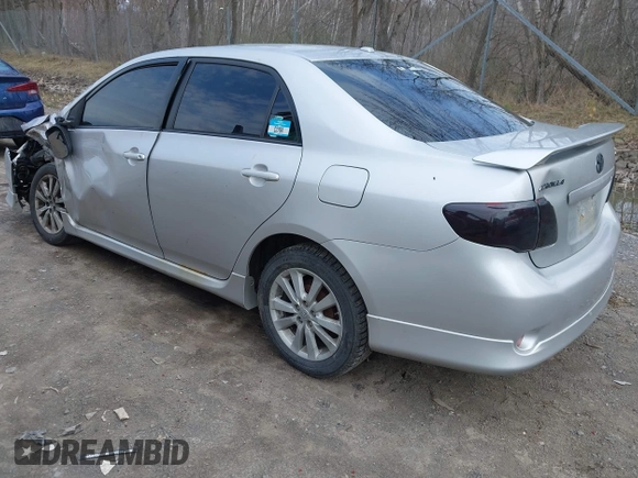 2009 Toyota Corolla with VIN 2T1BU40E69C123823, listed as a IAAI auction lot 42079964 with 204,124 mi miles. Bid and sale history available at carsss.com. Image 3.