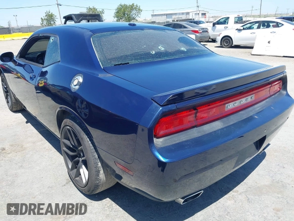 2013 Dodge Challenger R/T z VIN 2C3CDYBT9DH565280, wystawiony jako IAAI lot #42315527 z przebiegiem 128 638 mil mil oraz . Historia ofert i sprzedaży dostępna na DreamBid. Obrazek 3.