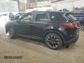 2016 Mazda CX-5 Grand Touring with VIN JM3KE4DY0G0854568, listed as a Copart auction lot 53259345 with 74,264 mi miles and Salvage Title. Bid and sale history available at carsss.com. Image 2.
