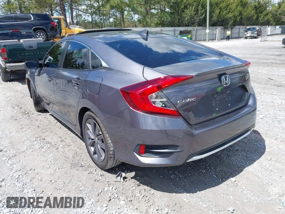 2021 Honda Civic Sedan EX with VIN 19XFC1F33ME012262, listed as a IAAI auction lot 41880047 with 67,861 mi miles. Bid and sale history available at carsss.com. Image 3.