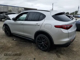 2019 Alfa Romeo Stelvio z VIN ZASPAJAN0K7C71850, wystawiony jako Copart lot #54234205 z przebiegiem Nie podano mil oraz Szkoda całkowita • Salvage title. Historia ofert i sprzedaży dostępna na DreamBid. Obrazek 2.