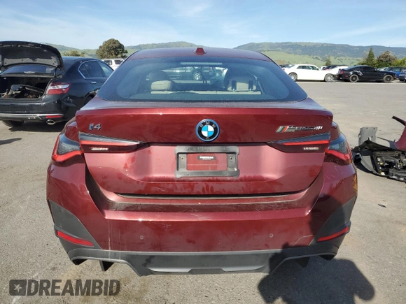 2022 BMW i4 eDrive40 with VIN WBY73AW05NFN05084, listed as a Copart auction lot 50677374 with 30,609 mi miles. Bid and sale history available at carsss.com. Image 6.