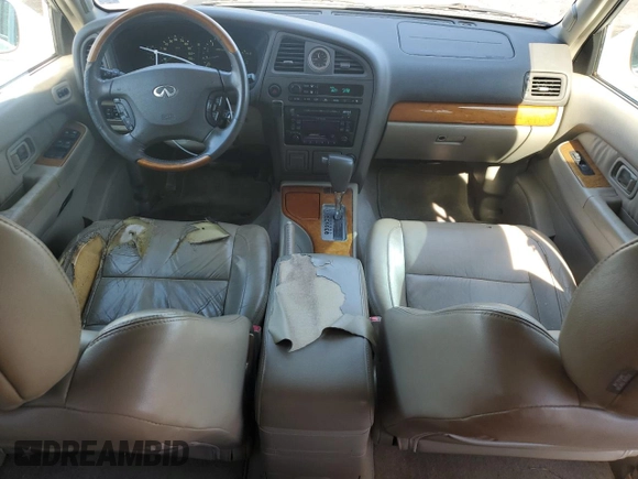 2003 Infiniti QX4 with VIN JNRDR09X33W250292, listed as a Copart auction lot 56020474 with 260,391 mi miles and Clean Title. Bid and sale history available at DreamBid. Image 8.