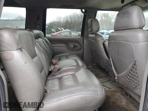 1997 GMC Suburban z VIN 1GKFK16R3VJ761305, wystawiony jako Copart lot #85785574 z przebiegiem 269 721 mil mil oraz Szkoda całkowita • Salvage title. Historia ofert i sprzedaży dostępna na DreamBid. Obrazek 11.