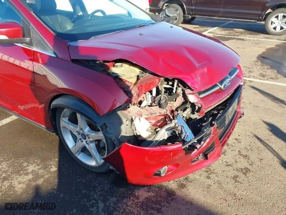 2014 Ford Focus Titanium with VIN 1FADP3J23EL137525, listed as a IAAI auction lot 41562684 with 127,104 mi miles. Bid and sale history available at carsss.com. Image 6.
