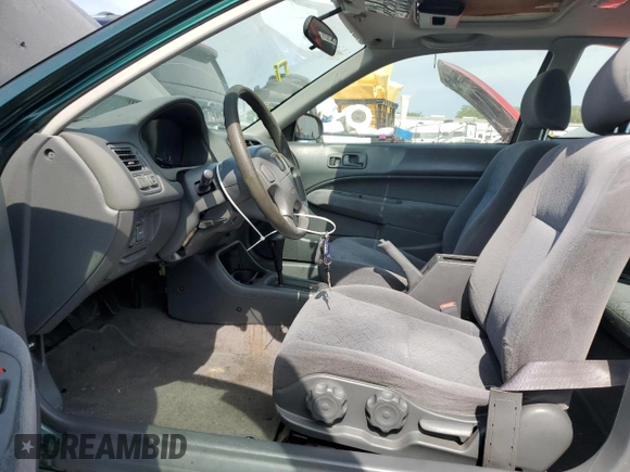 1999 Honda Civic EX with VIN 1HGEJ8243XL083130, listed as a Copart auction lot 60248885 with 331,458 mi miles and Salvage title. Bid and sale history available at DreamBid. Image 7.