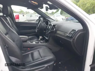 2021 Jeep Grand Cherokee 80th Anniversary with VIN 1C4RJFBG2MC568028, listed as a IAAI auction lot 42381104 with 51,027 mi miles and . Bid and sale history available at DreamBid. Image 5.